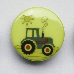 Knap med grøn traktor