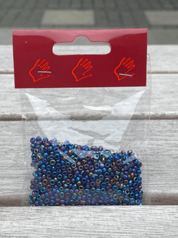 Glasperler i regnbuens farver