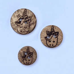 Mørke knapper med enhjørning