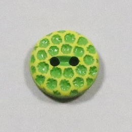 Plastikknap med prikker