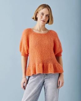 bluse-med-pufaerme-og-flaesekant