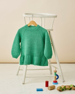 Strikkeopskrift til børn til en Tunika med flæsekant