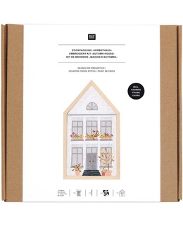 Broderi med et hus i efterårets farver