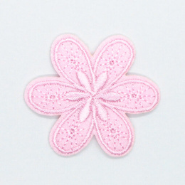 Strygemærke med lyserød blomst