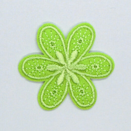 Strygemærke med grøn blomst