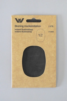 oval-lap-i-imiteret-ruskind-moerk-graa