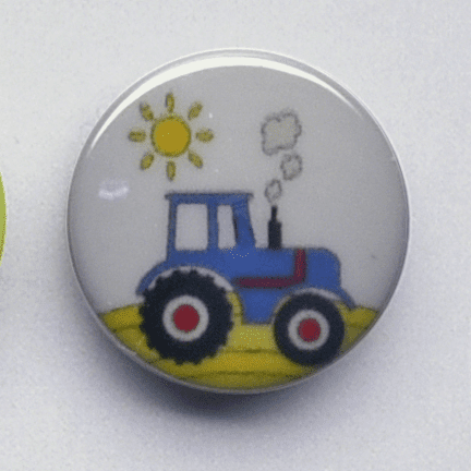 Plastikknap med traktor