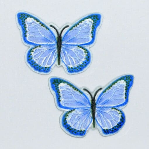 Strygemærker med blå sommerfugle