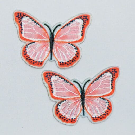 Strygemærker med røde sommerfugle
