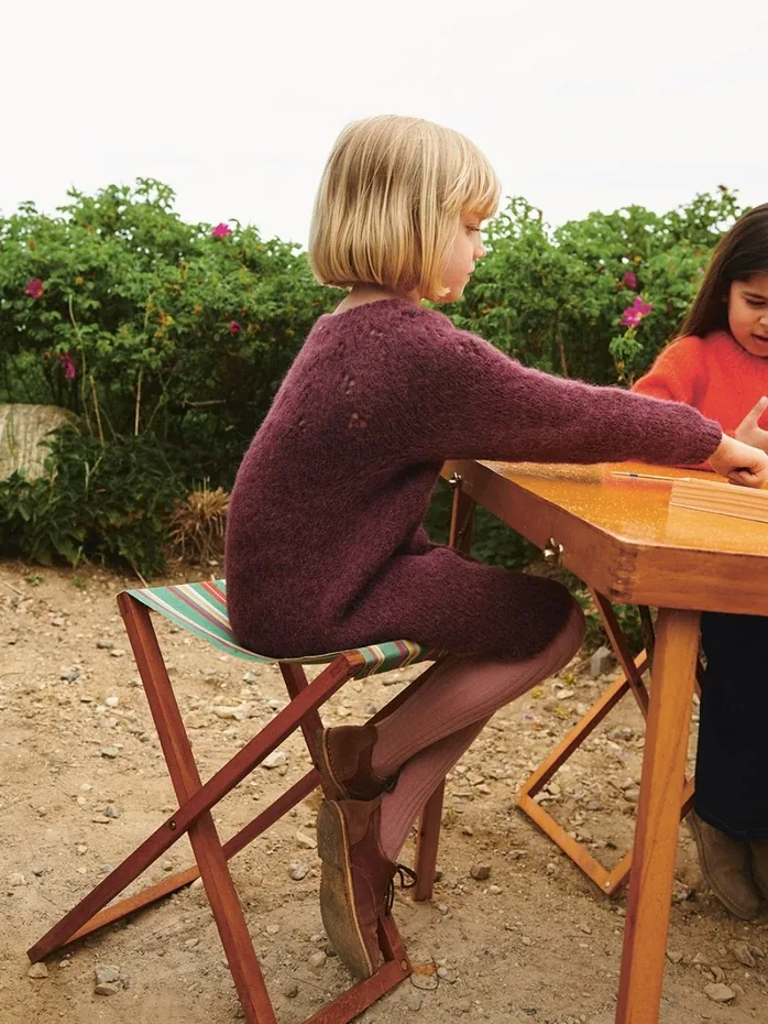 Sweet Pea Dress Junior set fra siden med kløvermønstret på bærestykket og den vide nederdel